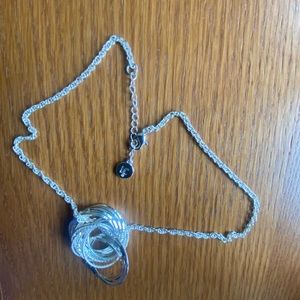 Pendant: All individual rings that are looped together.